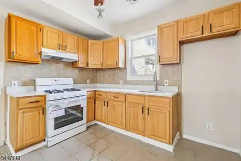 106 E Main St, Paterson City, NJ 07522 — photo 15