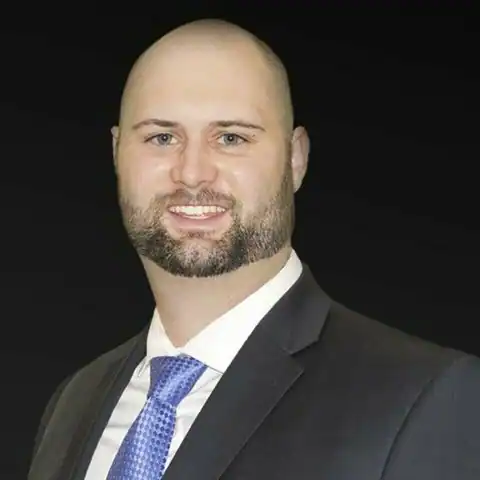 Travis P. Muller
